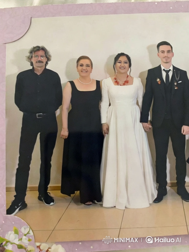 Woman in White Dress Smiles, Shakes Hands, and Hugs Me