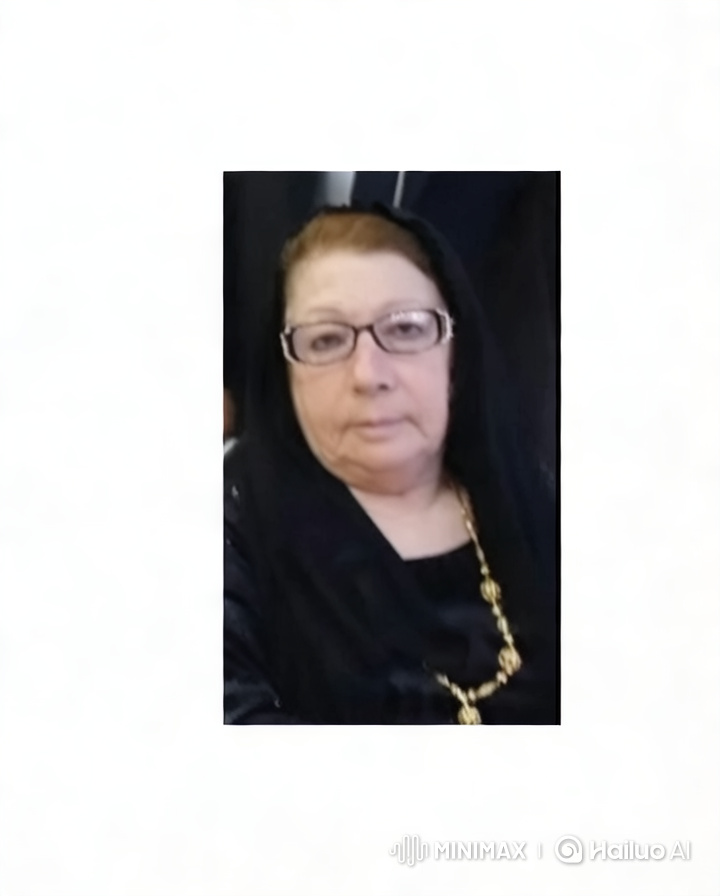 Serene Portrait: Woman in Black with Gold Necklace