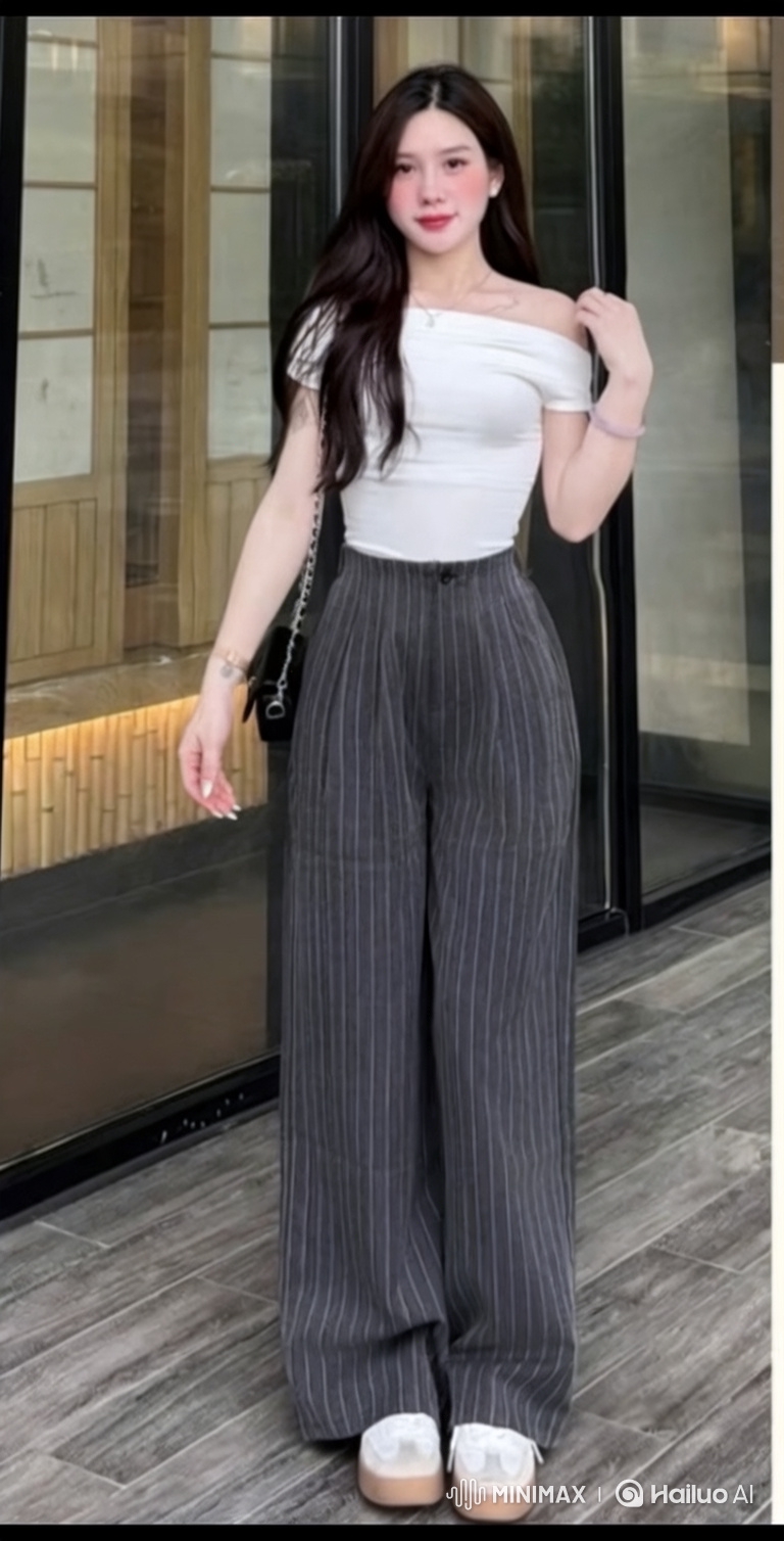 Fashion Model Showcases Handbag with Graceful Walk