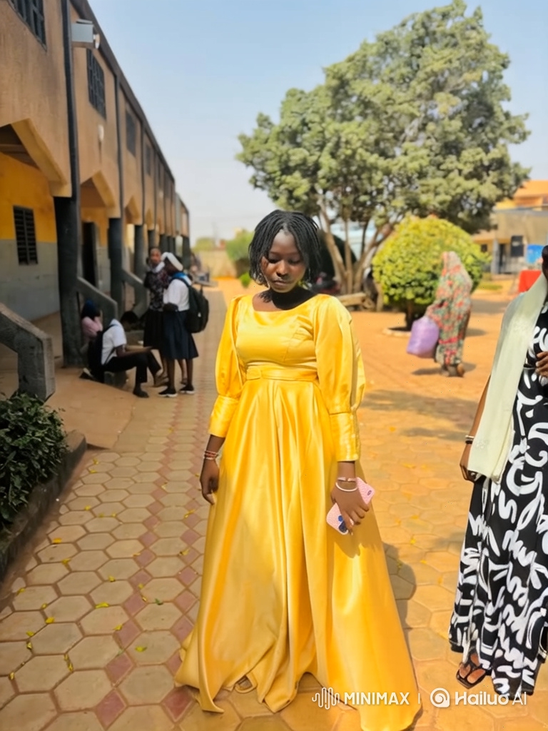 Young Woman in Yellow Gown Enters Tesla Car