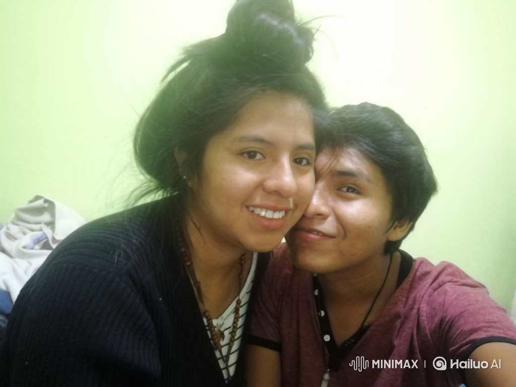 Young Couple and Daughter Embrace in Joyful Family Moment
