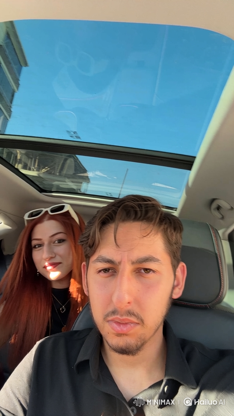 Family Portrait: Man, Woman, and Child in Car