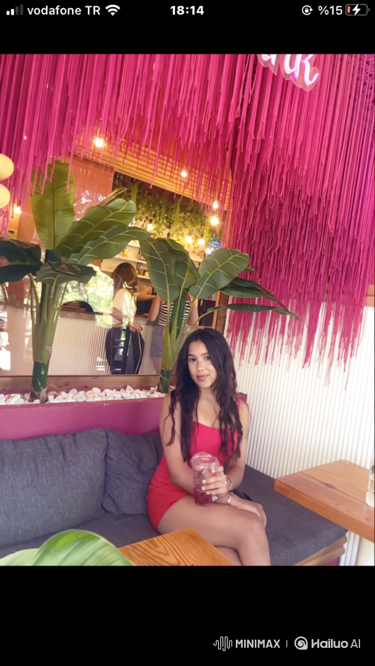 Young Woman in Red Dress Detained by Police in Trendy Cafe
