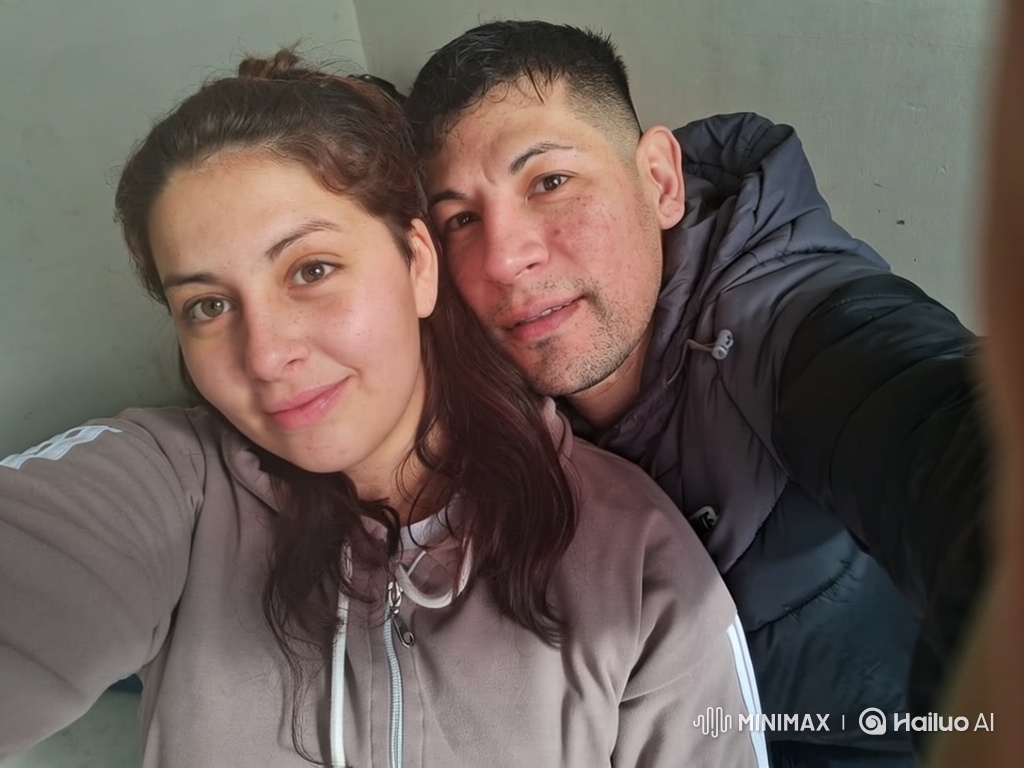 Intimate Family Portrait: Couple and Child Embrace