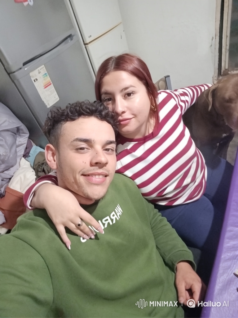 Family Portrait: Loving Moment of a Young Couple and Their Daughter