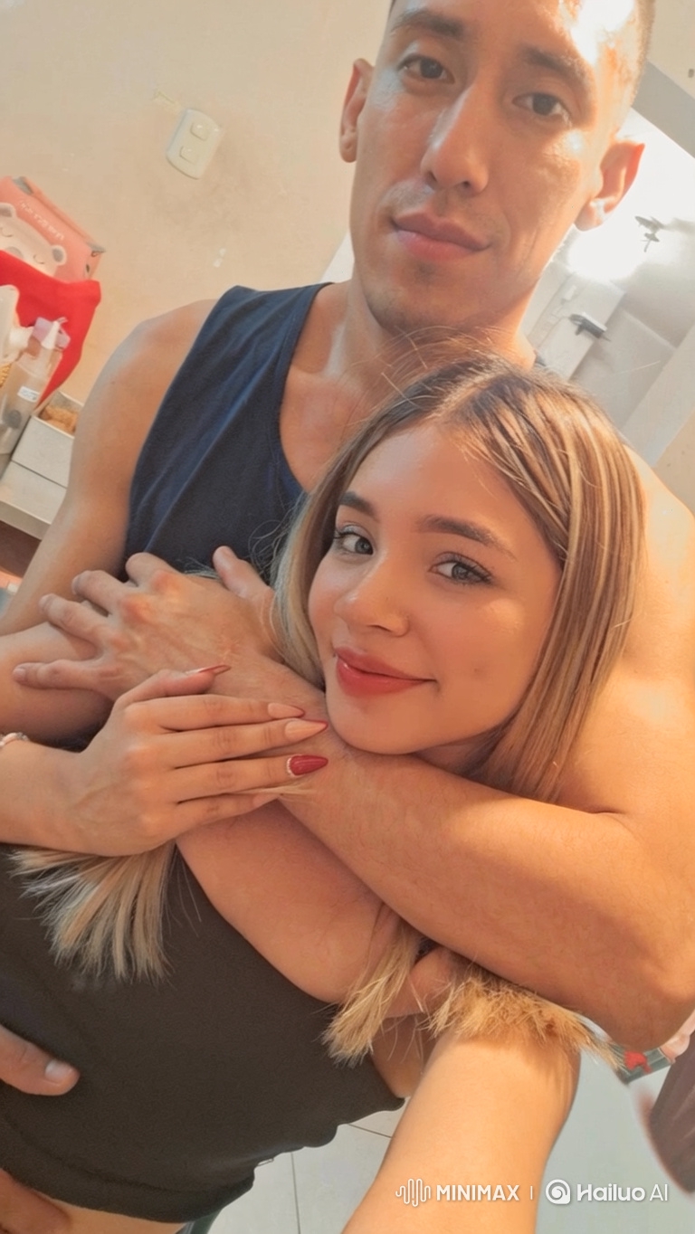 Family Embrace: Couple and Daughter's Tender Moment