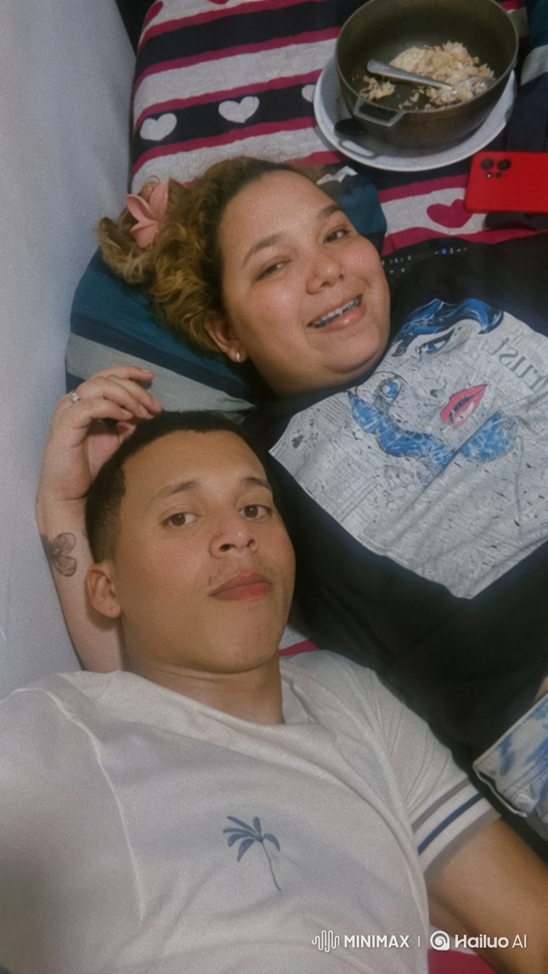 Family Love: Couple and Daughter Share Intimate Moment