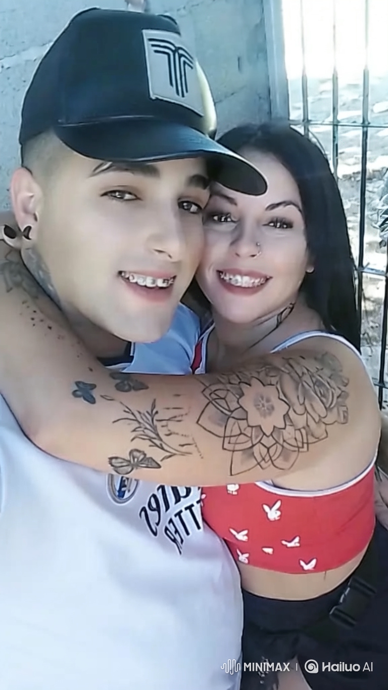 Family Portrait: Loving Embrace of Tattooed Couple and Their Child