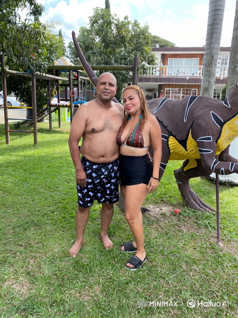 Family Portrait: Man, Woman, and Daughter on Lawn