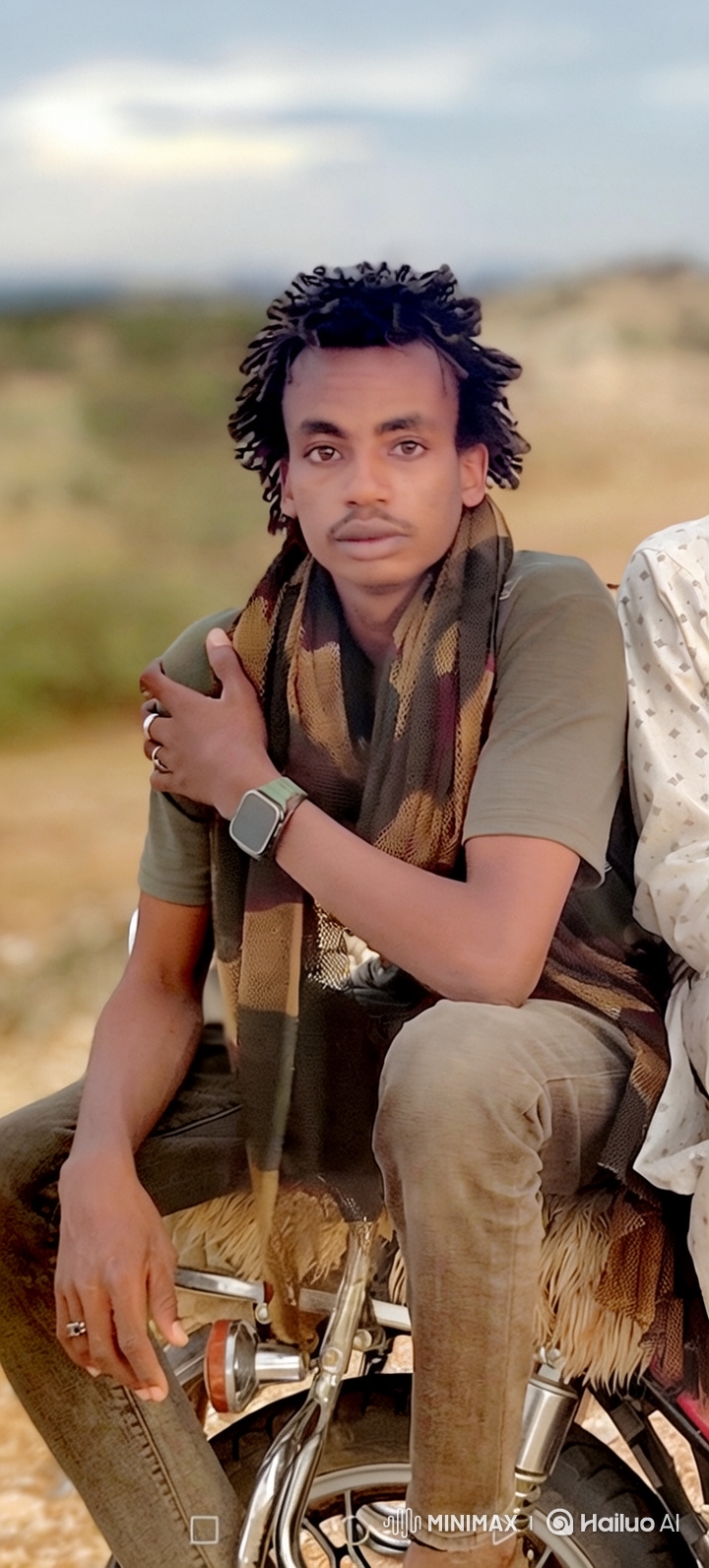 Young Man with Dreadlocks in Calm, Close-up Portrait