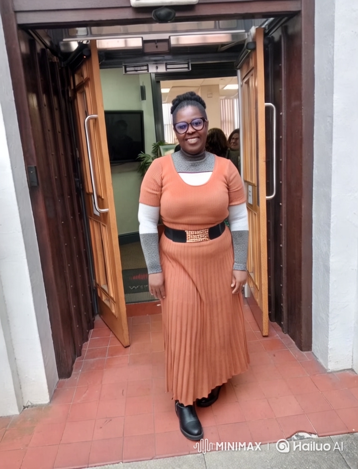 Stylish Woman in Rust Dress Showcases Elegant Scene