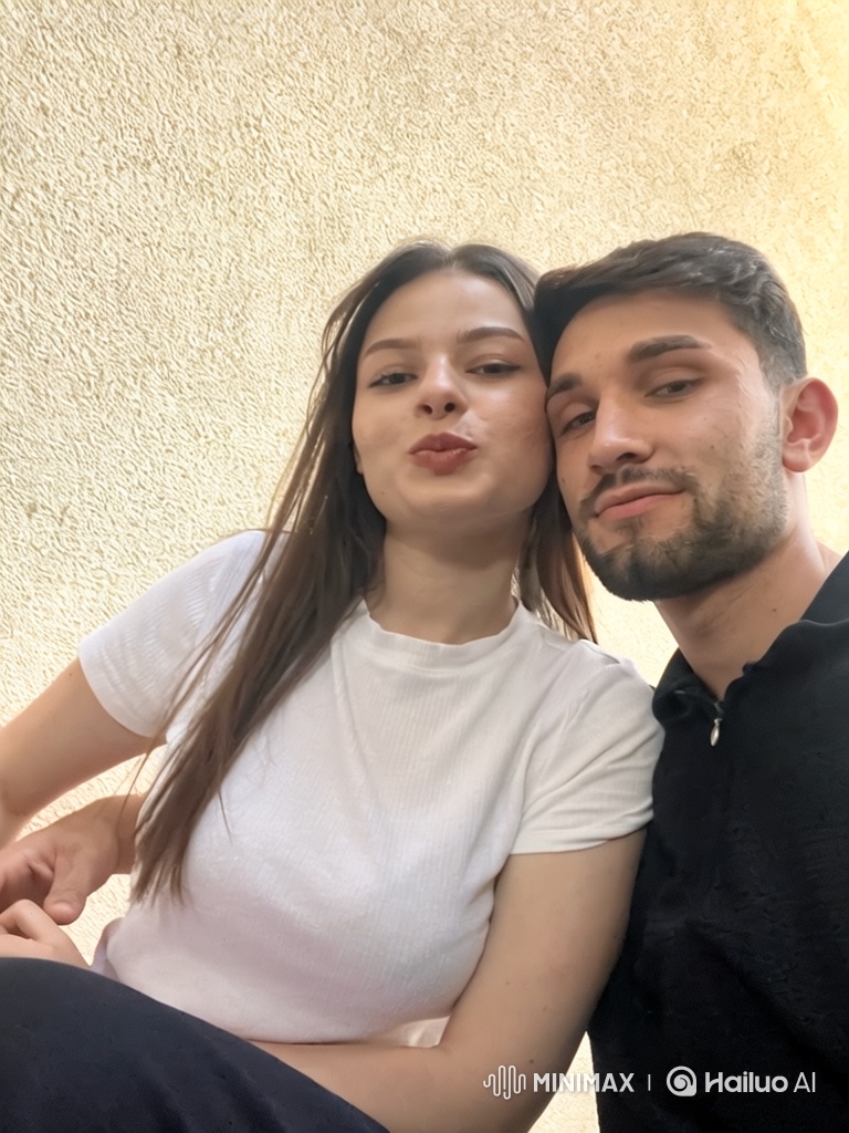 Young Couple and Daughter Share Loving Moment