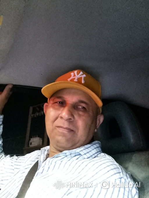 Middle-Aged Man Enjoys Dancing in Car at Night
