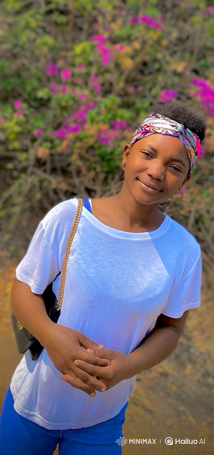 Young Woman Smiles Warmly Amidst Nature's Beauty