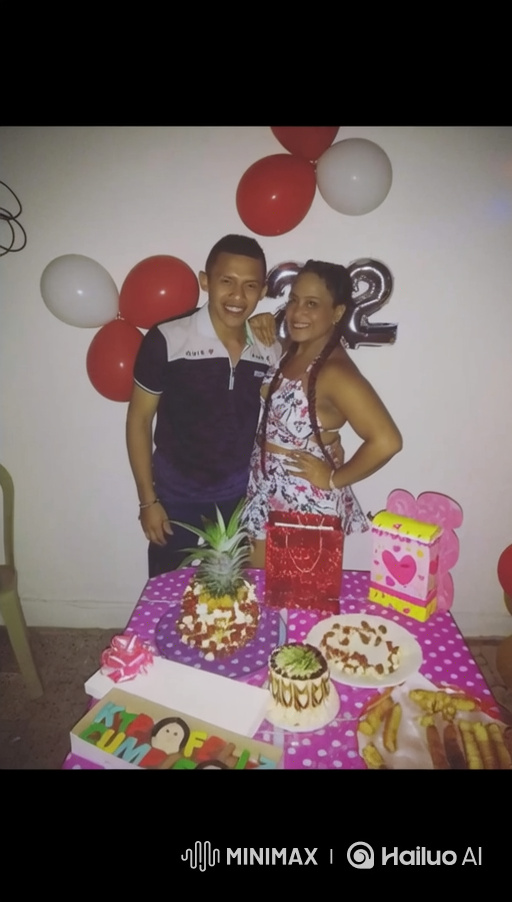 Family Celebration: Couple and Toddler's Joyful Moment