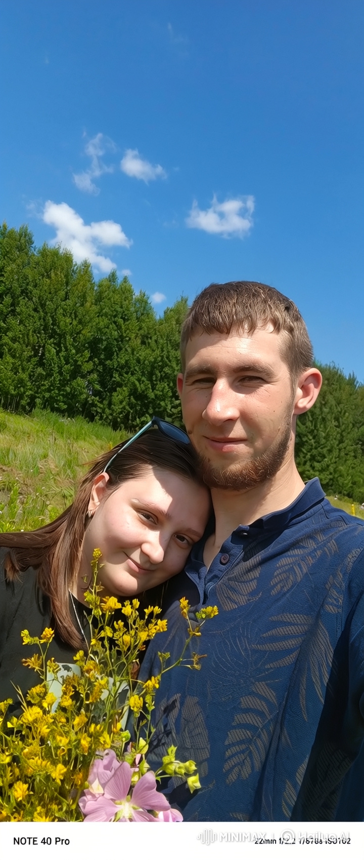 Couple and Child Embrace in Intimate Family Moment