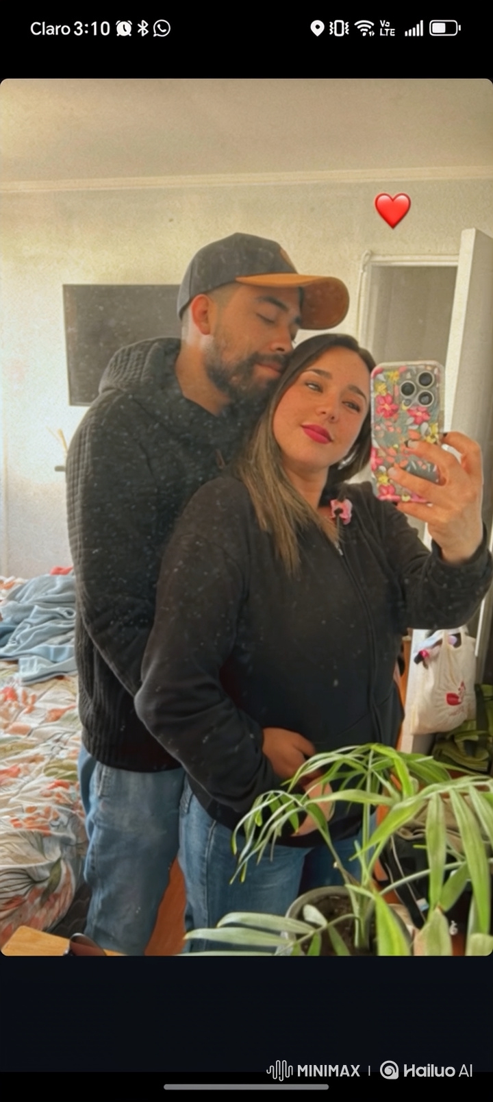 Couple and Child Share Intimate Mirror Selfie Moment