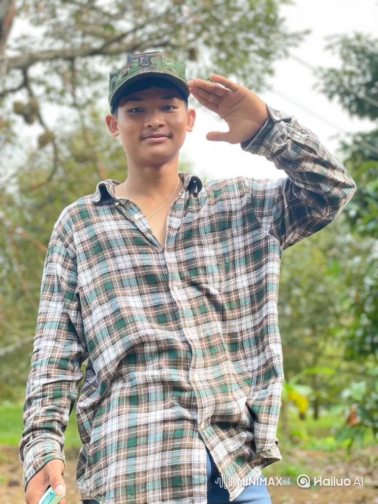 Young Man Joyfully Dancing in Nature