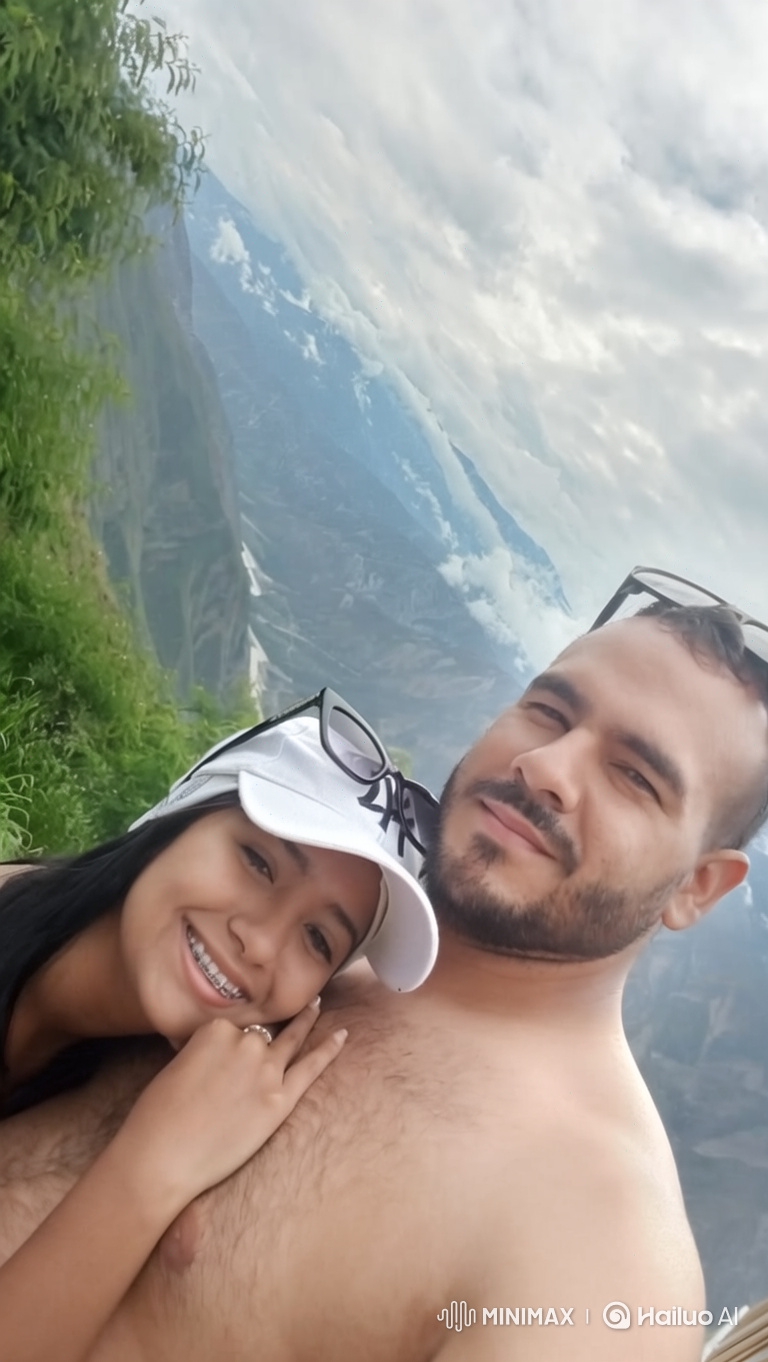 Family Portrait: Couple and Daughter in Mountains