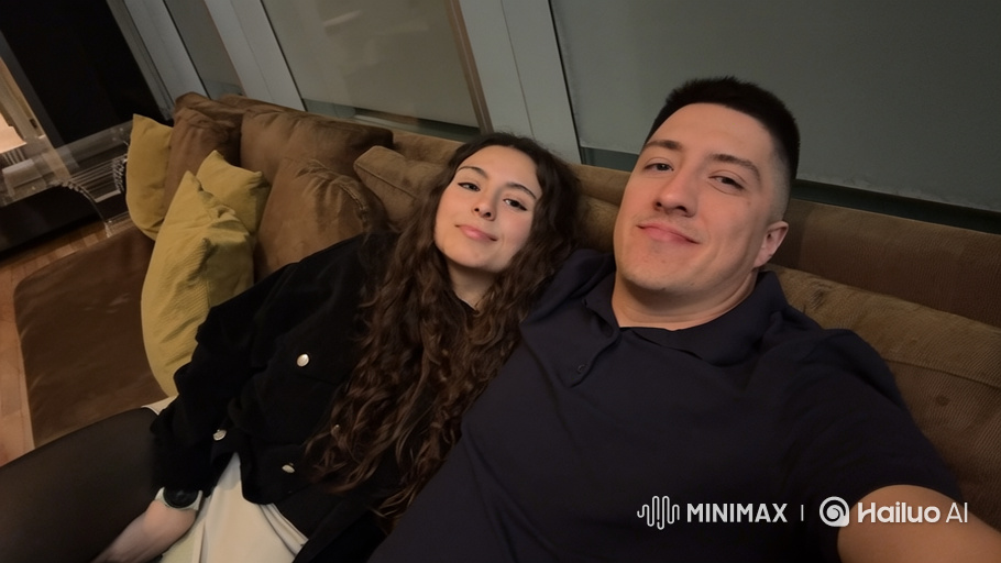 Family Portrait: Couple and Daughter on Sofa
