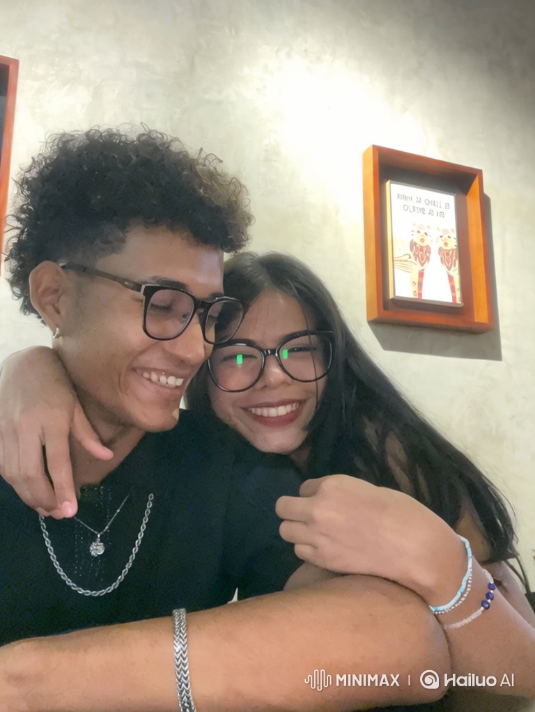 Young Couple and Daughter Share Warm Embrace