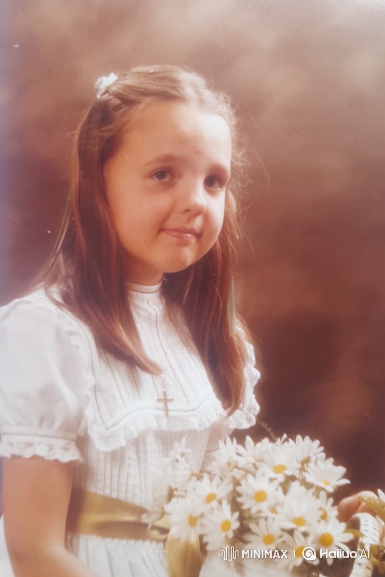 Young Girl in White Dress Winks and Smiles with Daisies
