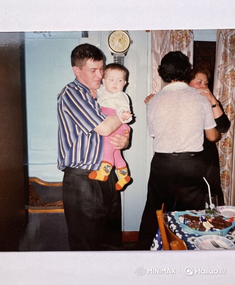 Family Celebration: Father Dancing with Baby