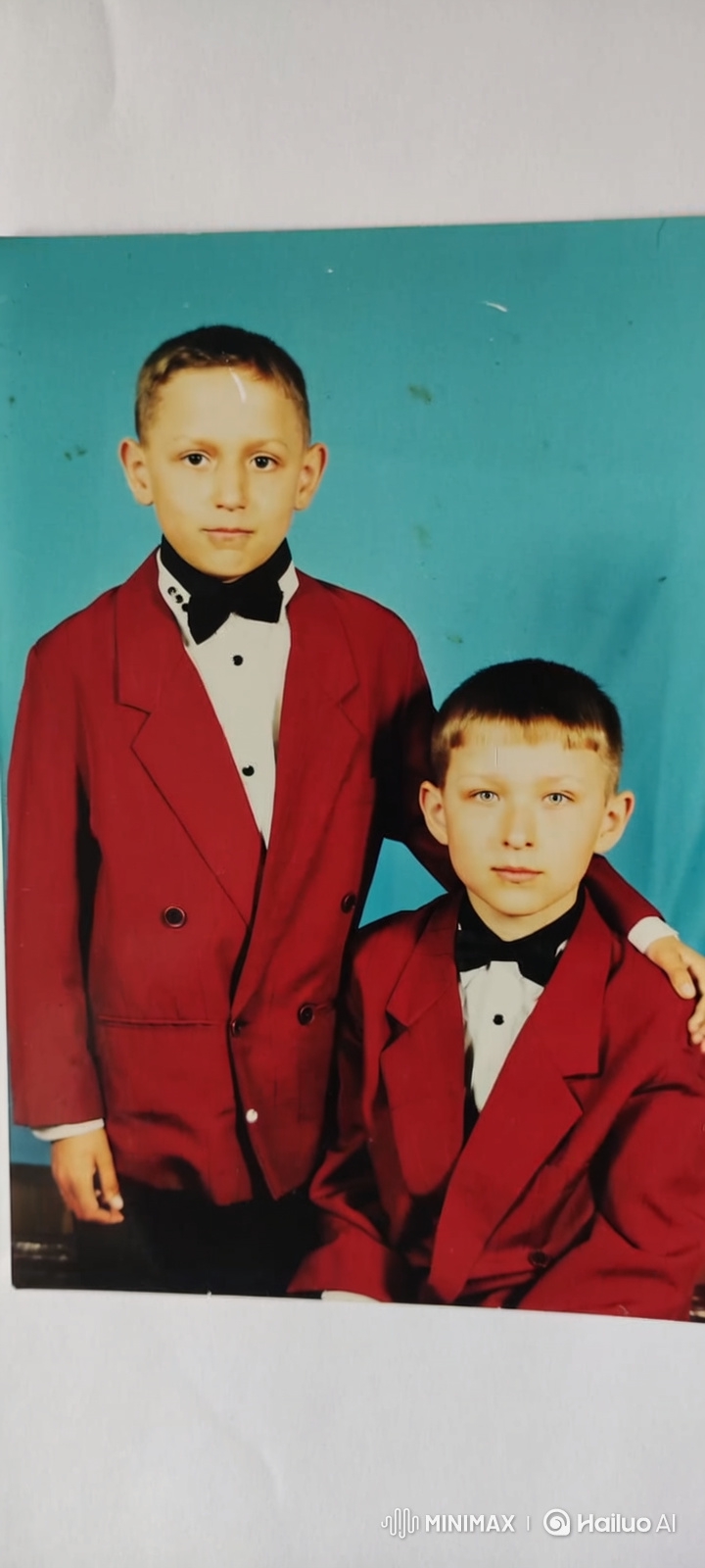 Brothers' Bond in Nostalgic Studio Portrait