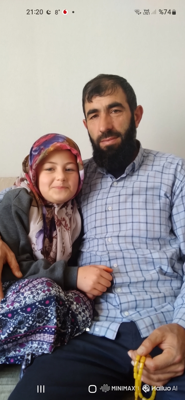 Father and Daughter Embrace Amidst Family Moments