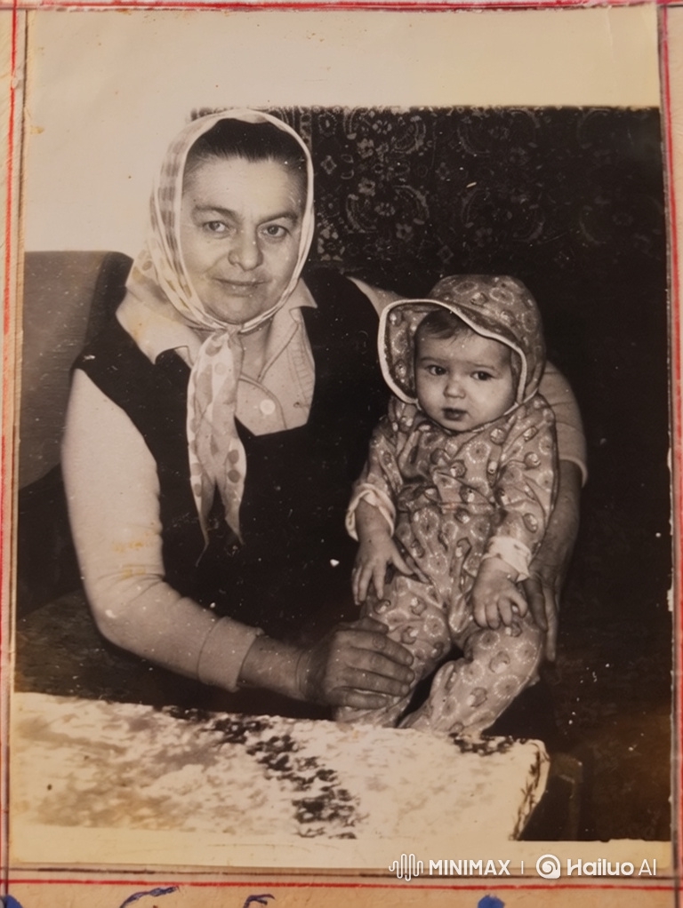 Vintage Portrait Captures Tender Moment Between Woman and Baby