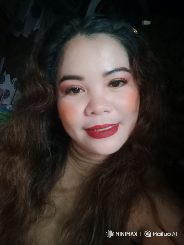 Woman with Makeup and Warm Smile in Close-Up