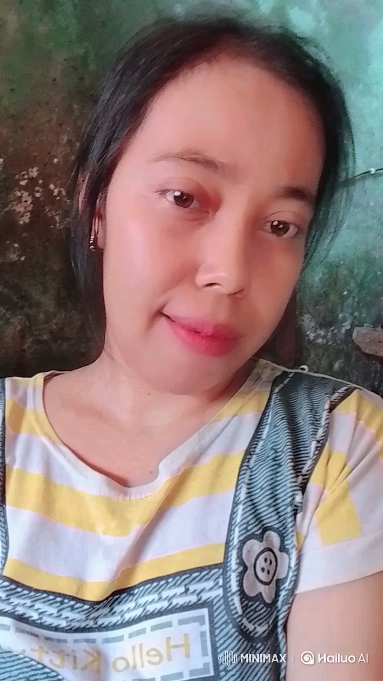 Portrait of a Calm East Asian Woman with Soft Blinking