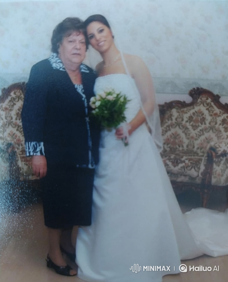 Mother and Bride Share Loving Embrace in Wedding Photo