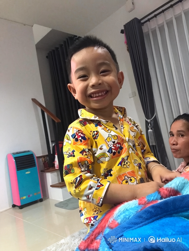 Boy's Joyful Morning Preparing a Fried Egg