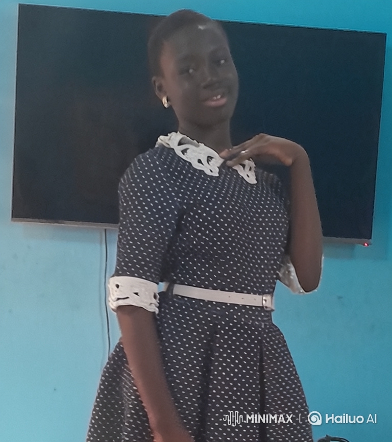 Graceful Young Woman in Polka-Dotted Dress Poses Confidently