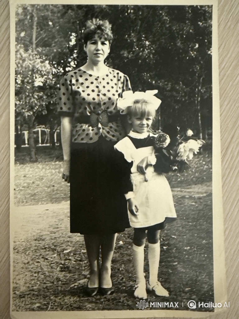 Woman and Girl Pose for Timeless Photo in Nature