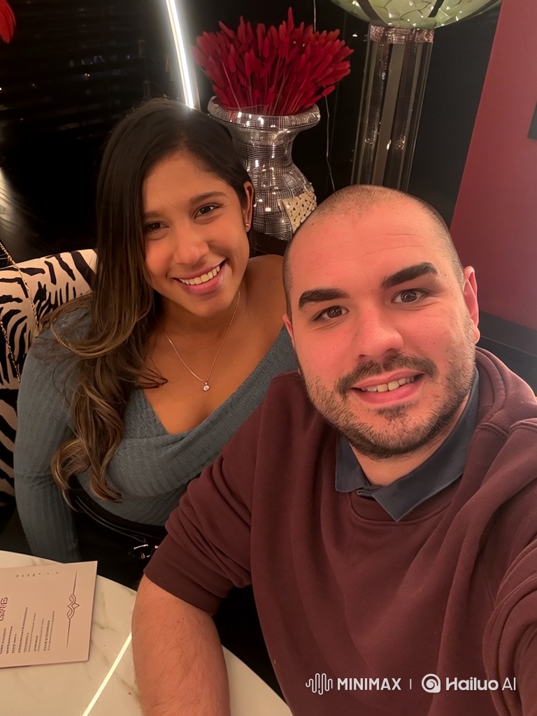Family Portrait: Couple and Baby in Chic Restaurant