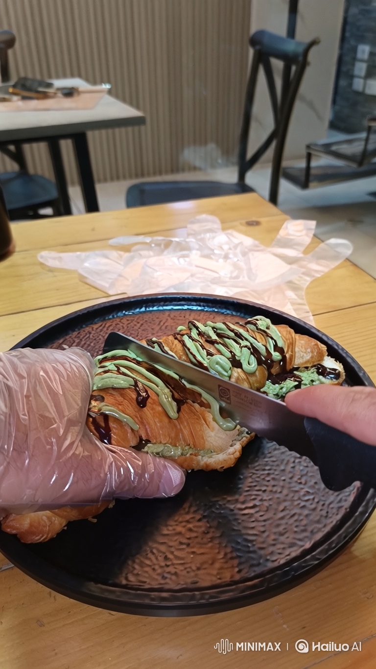 Artful Close-Up of a Croissant with Cream and Chocolate