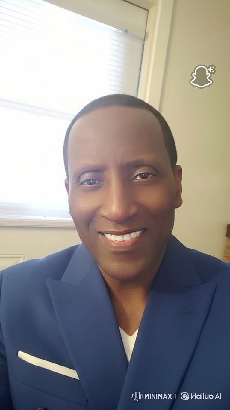 Close-up Portrait of a Friendly Middle-Aged Man in a Suit