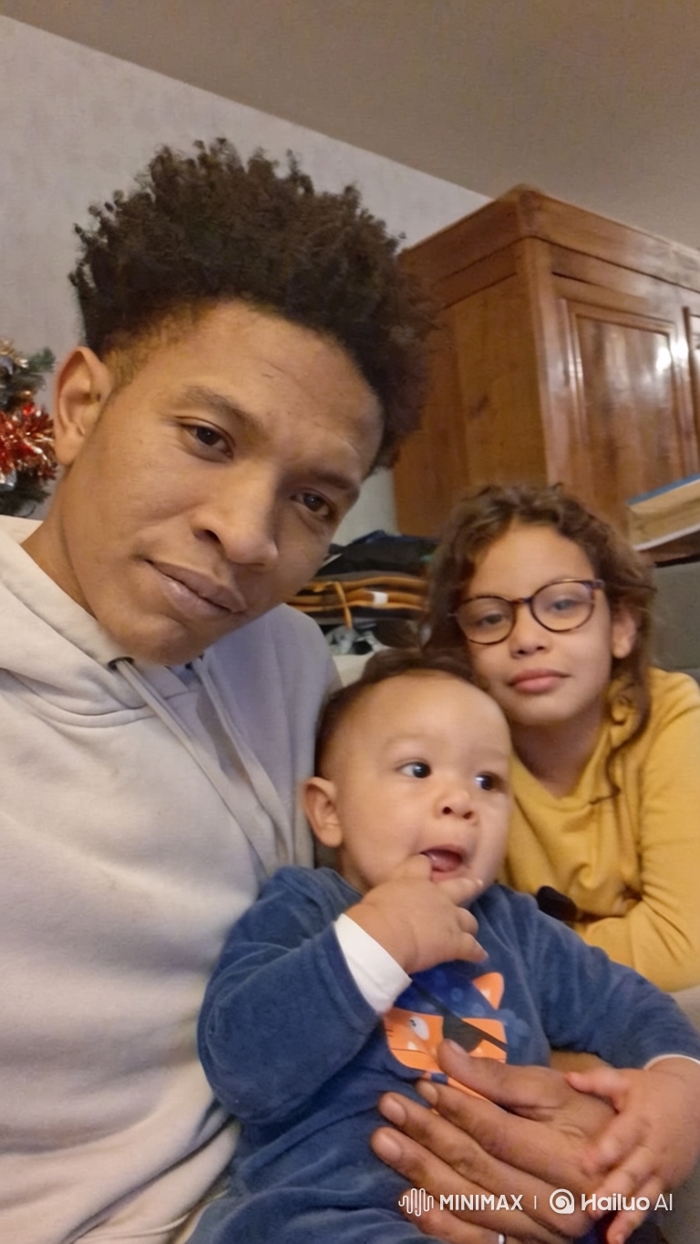 Family Portrait: Father's Smile, Daughter's Affection, Baby's Curiosity