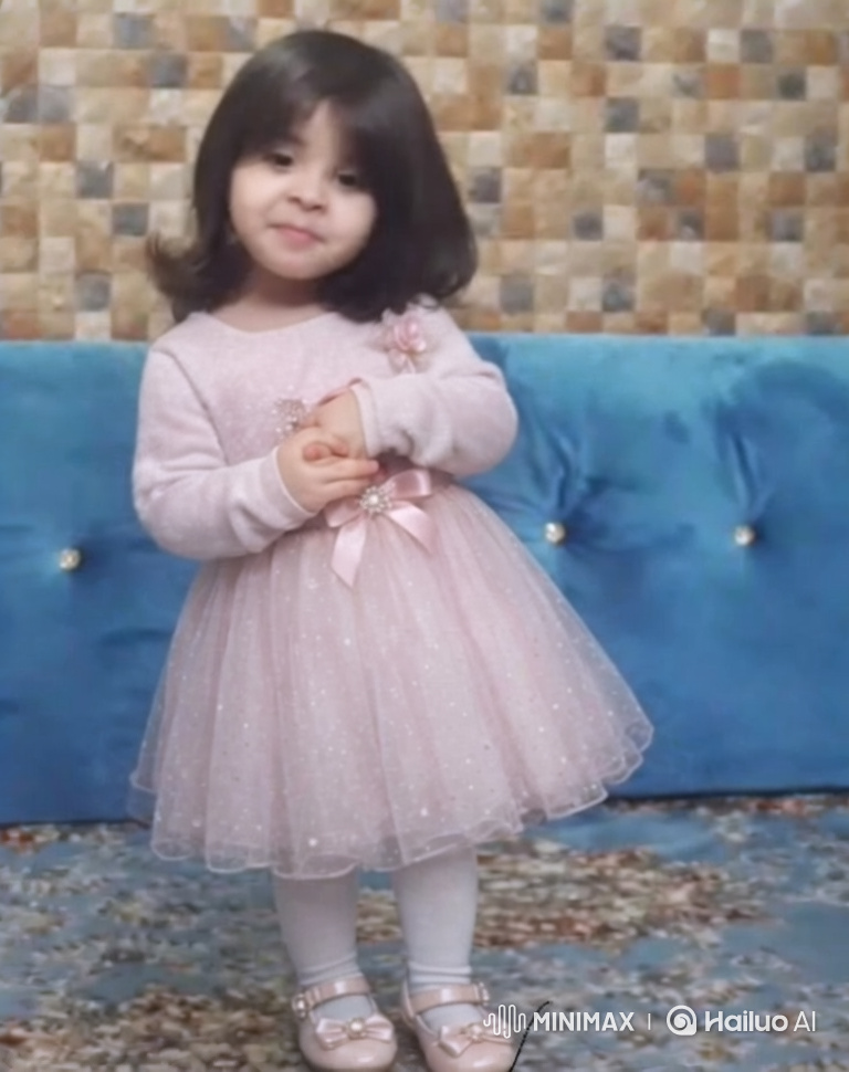Charming Little Girl in Elegant Pink Dress