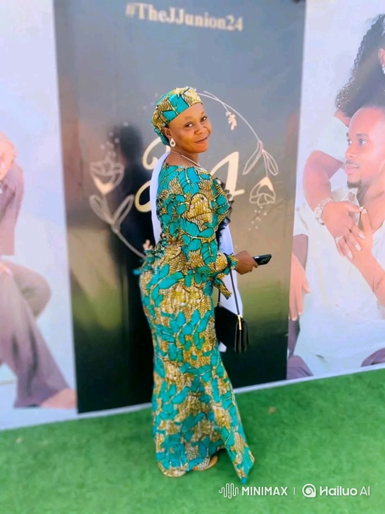 Woman in Elegant Gown Smiles at Camera