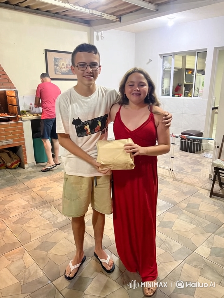 Teen Couple Receives Gift at Family Barbecue