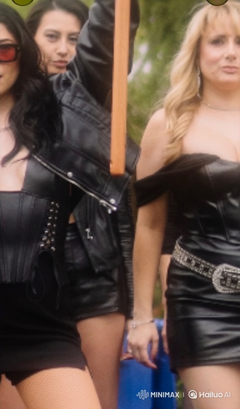Woman in Leather Dress Reunites Joyfully with Man