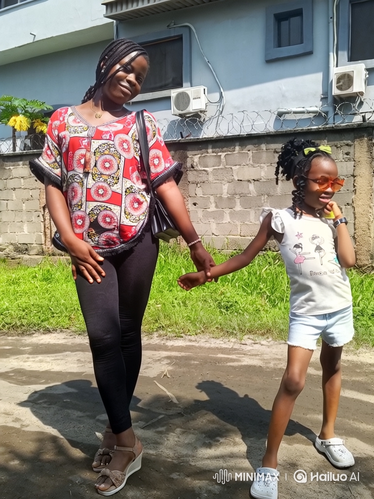 Woman and Girl Cook Nigerian Jollof Rice Together
