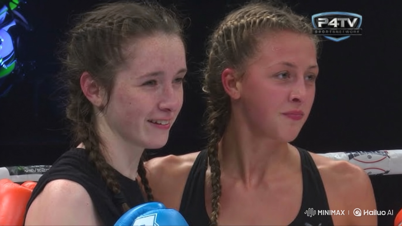 Boxers Share a Warm Embrace in the Ring